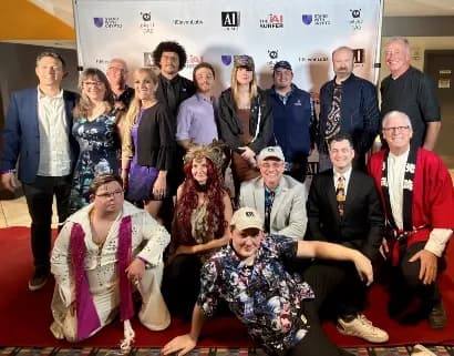 Creators dressed for an AI Film 3 celebration